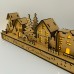 Wooden Christmas Light up Decoration Featuring a Village Scene With Tree and Houses. Laser Cut Wood is Hand Assembled With LED Lights. UK